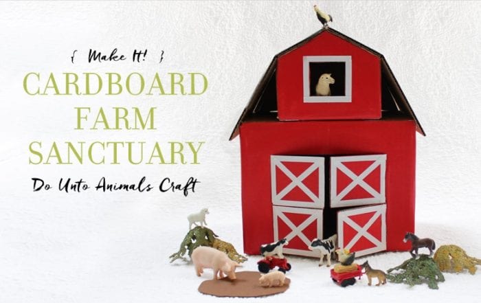 Red crafted barn with farm animal figurines